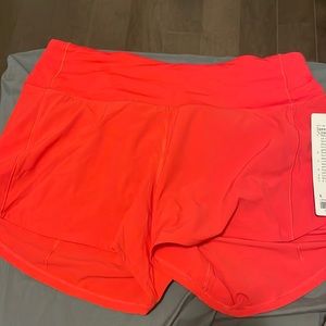 Red Lululemon speed up mid rise shorts